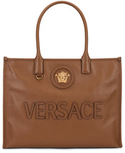 Carica l'immagine nel visualizzatore di Gallery, Borsa tote in pelle con placca Medusa
