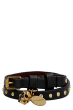 Carica l'immagine nel visualizzatore di Gallery, Bracciale in pelle con pendente logato e teschio
