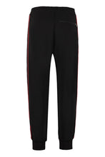 Carica l'immagine nel visualizzatore di Gallery, Track-pants con bande laterali logate
