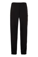 Carica l'immagine nel visualizzatore di Gallery, Track-pants con bande laterali logate
