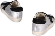Load image into Gallery viewer, Superstar metallic leather low-top sneakers
