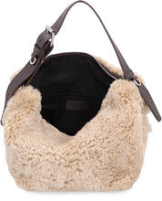 Carica l'immagine nel visualizzatore di Gallery, Borsa a mano in shearling
