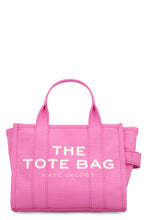 Load image into Gallery viewer, La traduzione di "The Small Tote Bag in canvas" dall'inglese (EN) all'italiano (IT) è: "La piccola borsa tote in tela".
